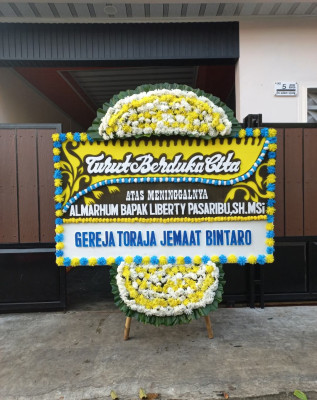 Papan Bunga Duka di Marang Kayu
